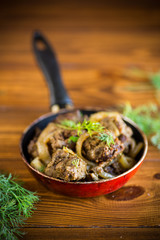 Beef liver fried with onions and herbs