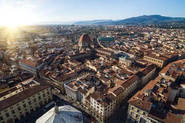 Cappella dei Principi dominates the San Lorenzo architectural complex (Medici Chapels). Aerial city top view from Giotto's Campanile. Florence, Tuscany, Italy.