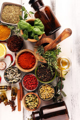 Spices and herbs on table. Food and cuisine ingredients with pepper