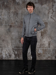 Obraz premium Full length studio portrait of attractive young man. Young Male Fashion Model Posing In Casual Outfit. 