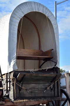 1914 Covered wagon: Canvas, ribs and bench seat.