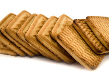 square cookies isolated on white background. A lot of cookies, macro photo.