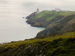 Fototapeta na wymiar lighthouse at the cliff