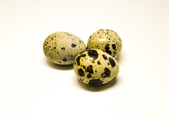 Fototapeta premium quail eggs on a white background