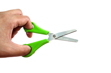scissors in hand on a white background.