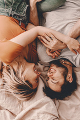 Happy couple spent time together. Smiling and laughing. Funny moments. Lifestyle apartment living....