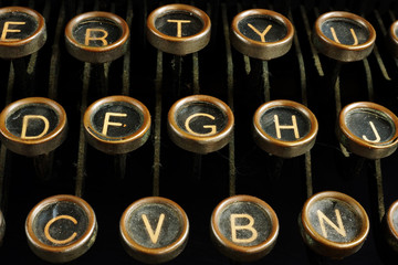 Close up of retro vintage typewriter keys. Content creating and blogging concept.