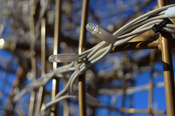 Little lamps. Garland lamps. A lot of garland lamps and sky. Holiday lamps.