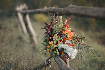 Wedding bouquet with hydrangea, orchid, gloriosa and roses. Boho style.