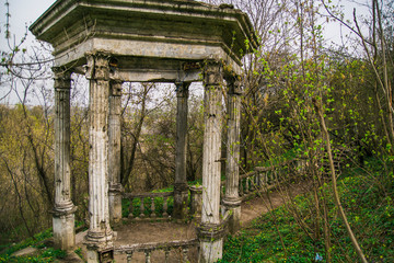 
Old abandoned altanka gazebo in the forest