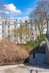 Paris, Montmartre, typical buildings and staircase, romantic view
