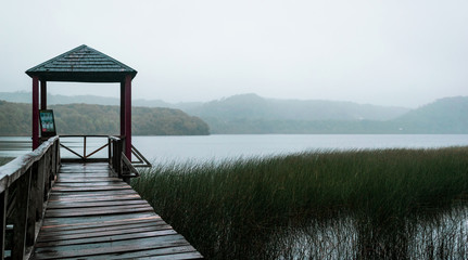 wooden bridge over lake.bridge in winter lake