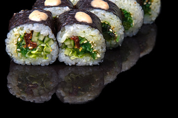 stuffed sushi on a dark background