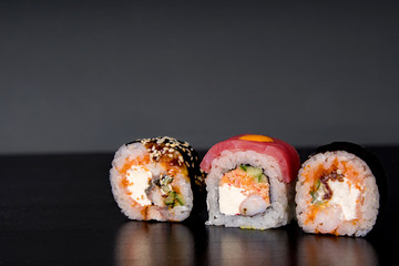 stuffed sushi on a dark background
