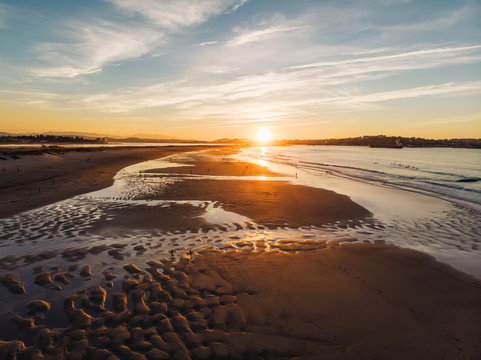 Aerial shot of Somo beach in northern spain famous for surfing at sunset