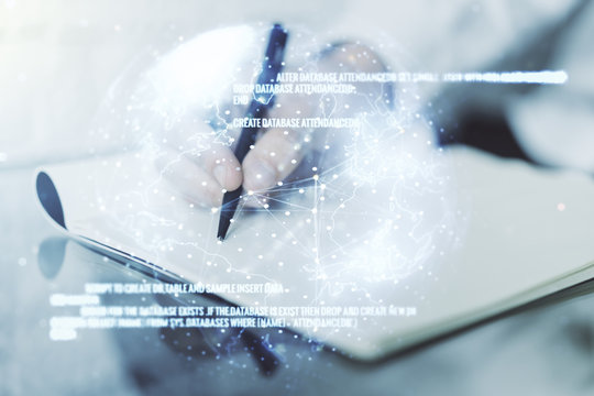 Double exposure of abstract creative programming illustration with world map and man hand writing in notepad on background, big data and blockchain concept