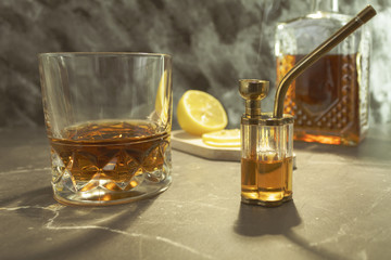 Alcohol and bong on the table