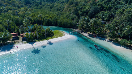 Island Thailand beach drone view of palm tree shadows on beach