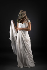 Woman in Wedding Dress and Gas Mask