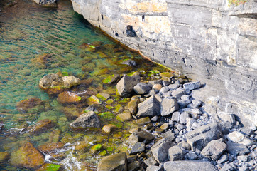 stones in the green water