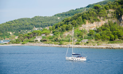 Yacht in the sea near the coast