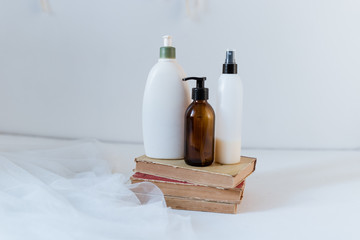 Fototapeta na wymiar cosmetics spray cream and gel on a white background