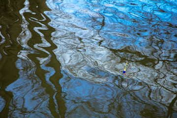 Beautiful reflection in the river of trees. Spring day