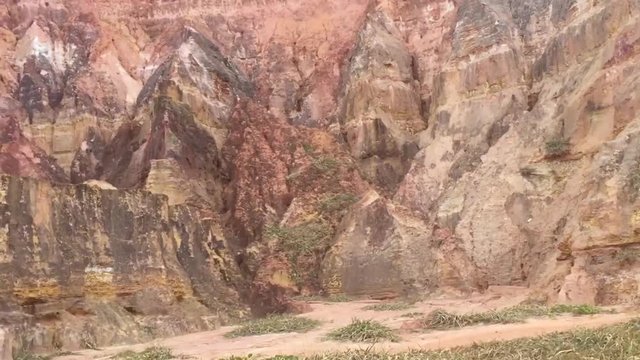 Beautiful relief with cliffs bordering the sea near Gunga beach in Alagoas, Brazil