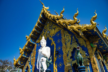 Fototapeta na wymiar A beautiful view of Wat Rong Suea Ten, the Blue Temple at Chiang Rai, Thailand.