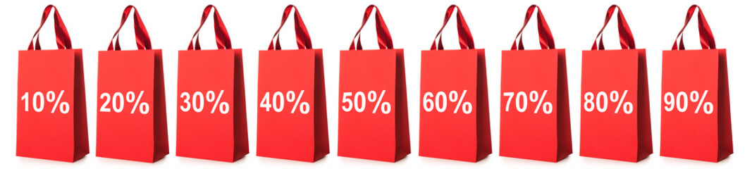 Red shopping bags with discount numbers