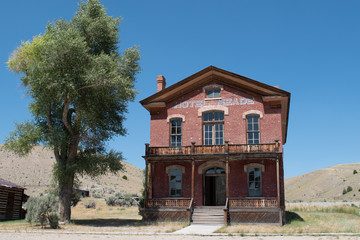 Old abandoned wooden hotel in Montana ghost town of Bannack.