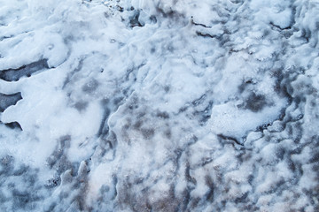 Obraz premium Close-up of abstract ice formations in the winter, viewed from above. Full frame background. Copy space.