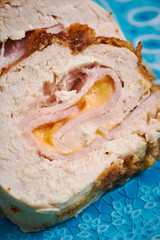 Close up of chicken breast stuffed with bacon and cheese