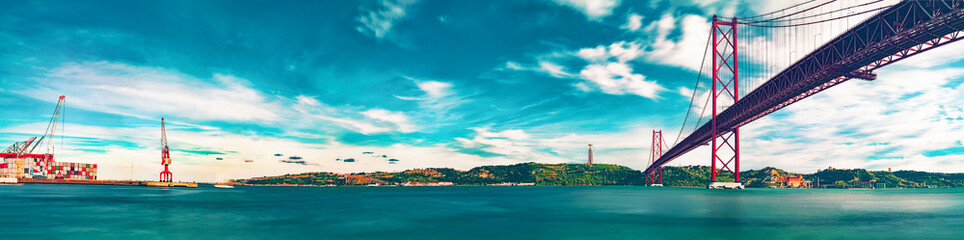 Places of interest in Lisbon, Portugal. Bridge of April 25 and sunset.Portuguese architecture and landmark