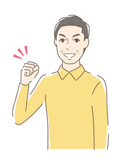 ガッツポーズする男性