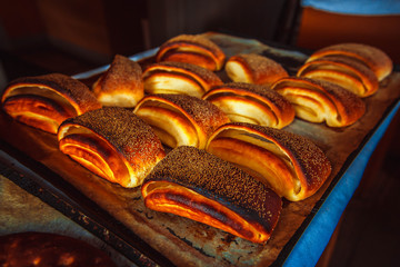 A detail of raw cinnamon buns . pies © popovatetiana