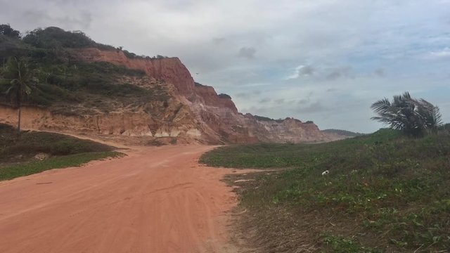 Alagoas, Brazil - mar 9 2020: Beautiful relief with cliffs bordering the sea near Gunga beach in Alagoas, Brazil