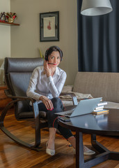 Woman working from home office during corona virus (COVID-19) outbreak on conference call