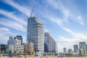 Fototapeta na wymiar Skyscraper at the Tel Awiw Mediterranean beach