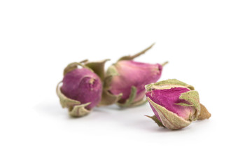 Dried rose flower head isolated on white background