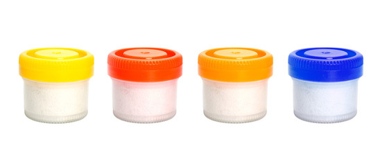 Plastic jar on a white background for use in cosmetology.