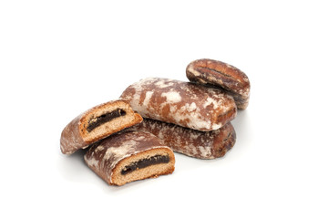 Gingerbread cookies with jam on a white background.