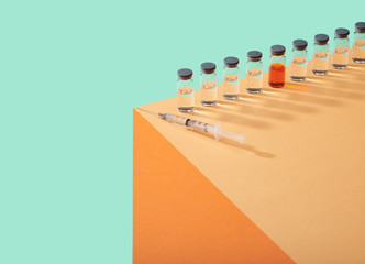 Corona Virus Covid 19 Vaccine Cure in Vial on Counter Table Top
Single vial lined up on edge of table surface  bright bold 