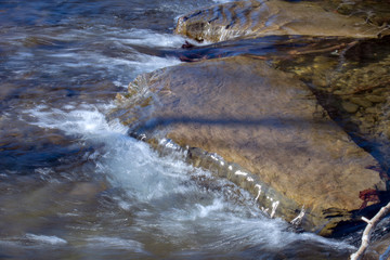 water flowing into a waterfall