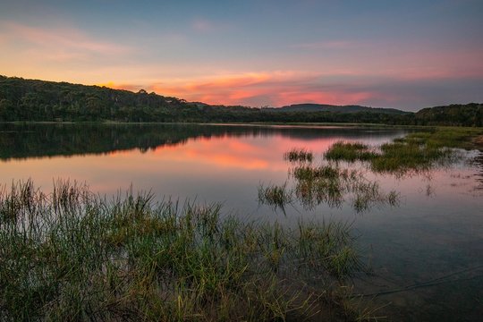 reveres sunset on the lake pink sky