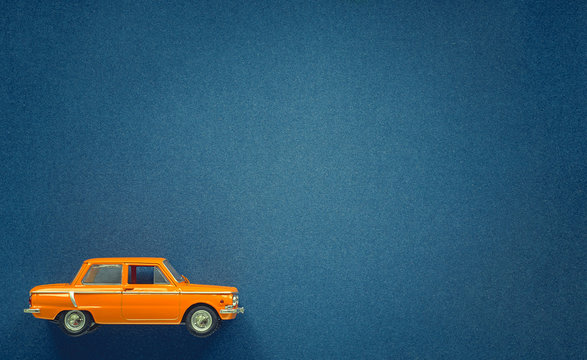 Orange car model on a blue background for the site. Zaporozhets 968-A, ZAZ
