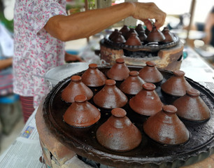 kind of Thai sweetmeat . Coconut milk mix with powder fried. Dessert of Thai traditional sweetmeat, Pancake, pudding, Thai Street food