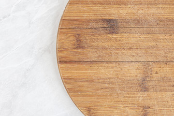 Flatlay above kitchen wooden board with kitchen dishtowel with copy space
