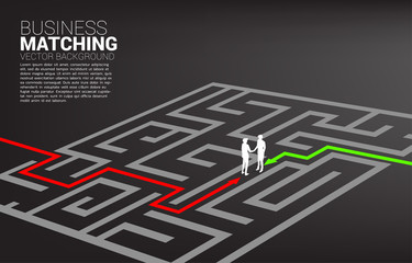 Silhouette of businessman handshake in the maze. Concept of business matching. Team work partnership and cooperation.