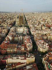 Fototapeta premium The house of Barcelona at sunset. Aerial photography